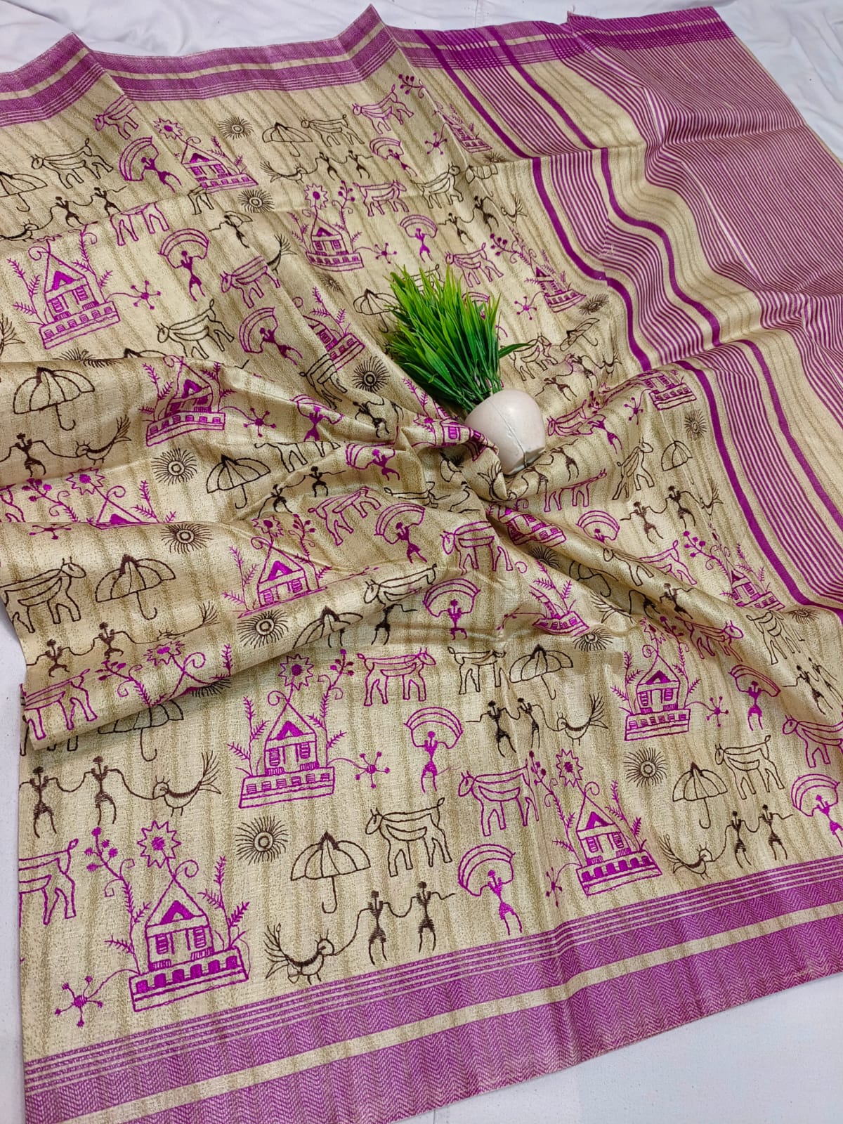 Embroidered semi tussar silk saree with tribal figure art
