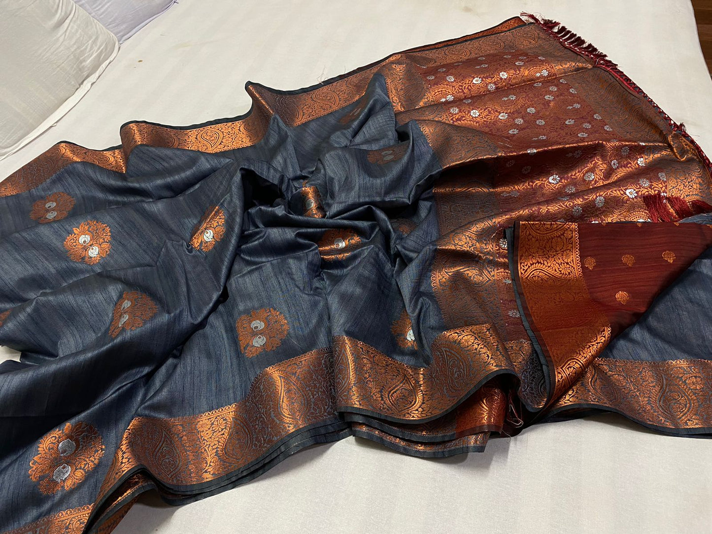 Poly raw silk saree with copper butta pallu