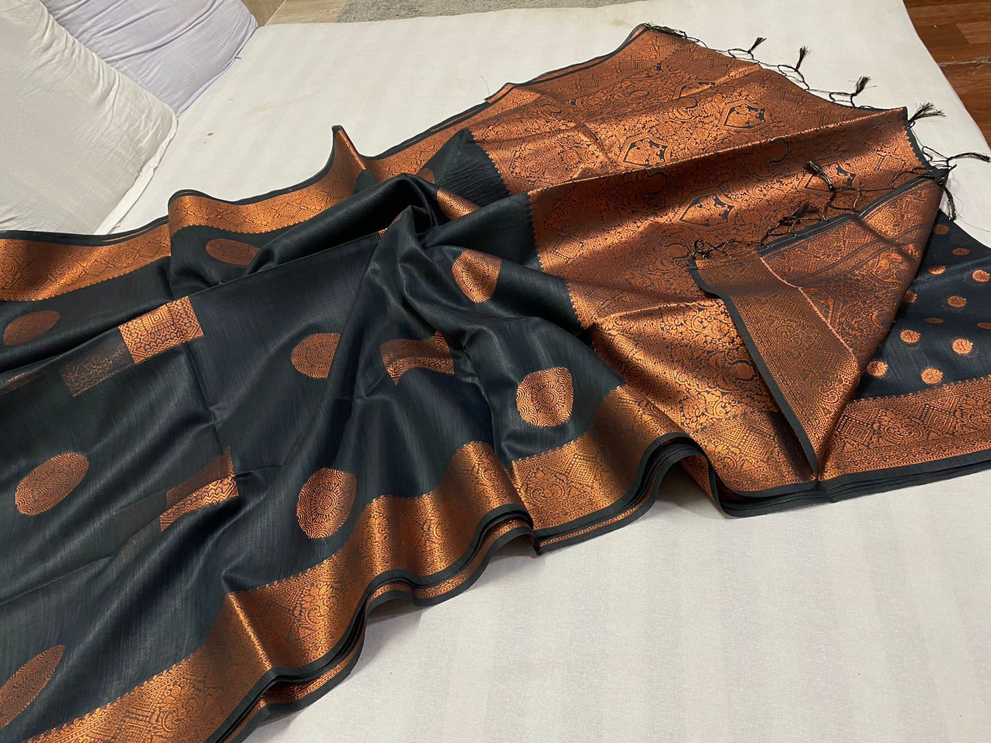 Poly raw silk saree with copper butta pallu