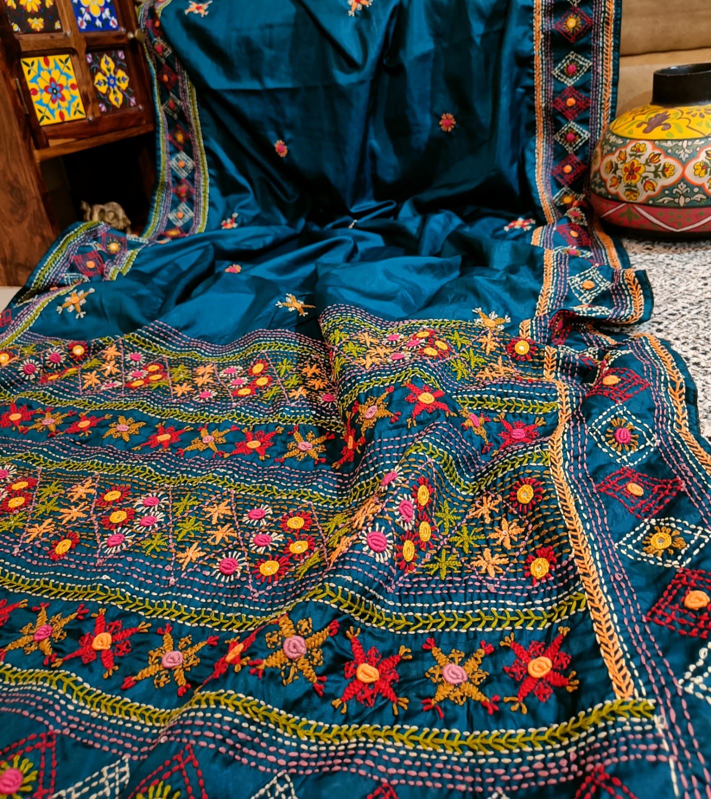 Russian silk saree with hand made lambani work