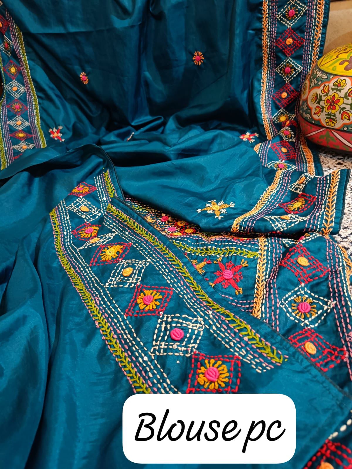 Russian silk saree with hand made lambani work