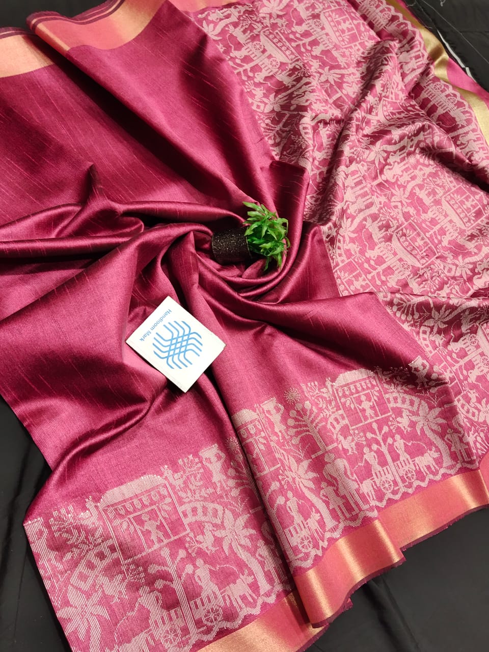 Semi raw silk saree with tribal figure border