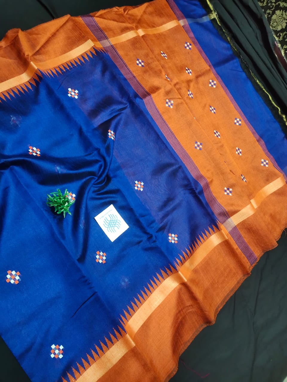 Semi Raw silk saree with temple border and body buti