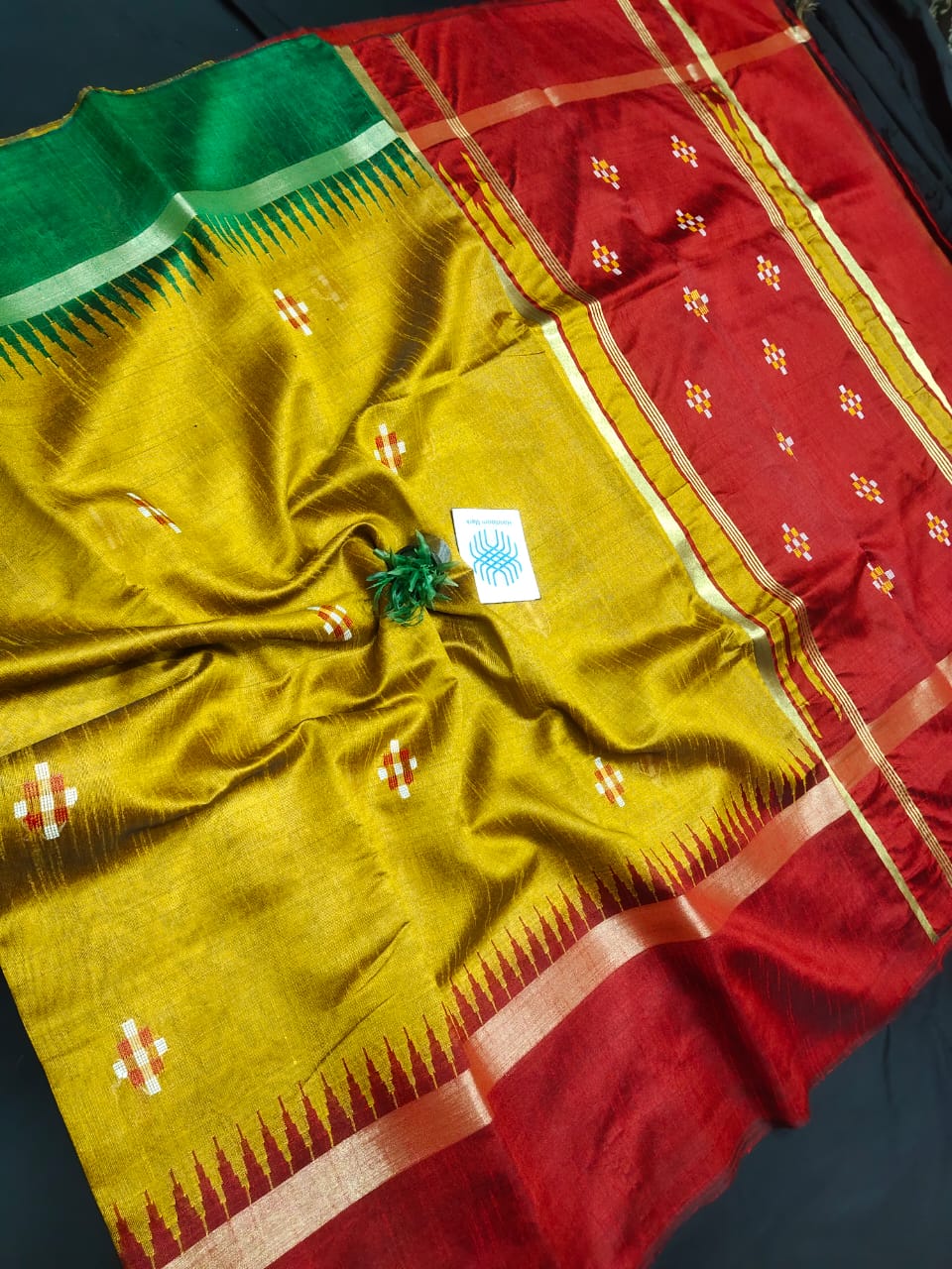 Semi Raw silk saree with temple border and body buti