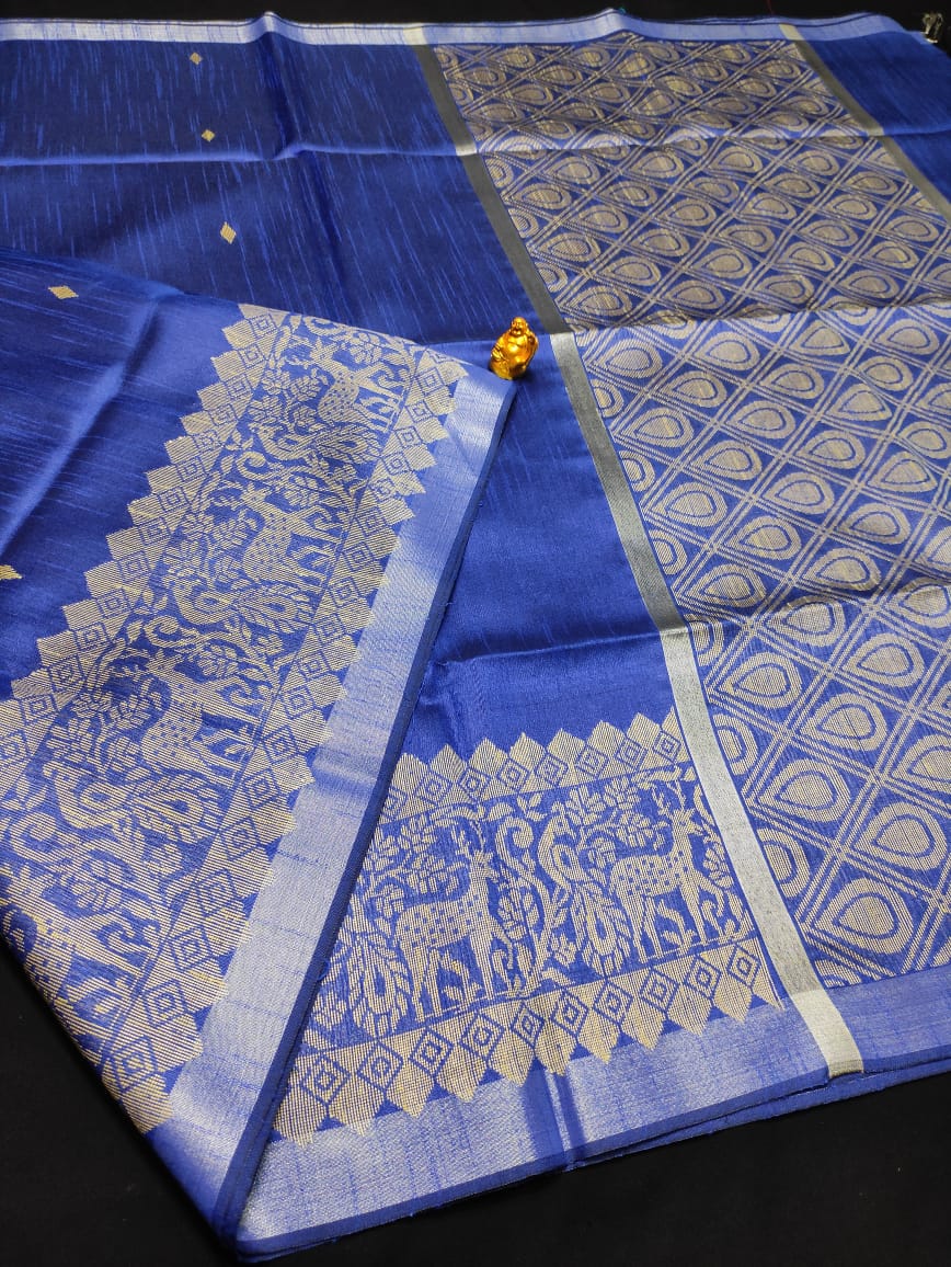 Semi raw silk saree with tribal buta border