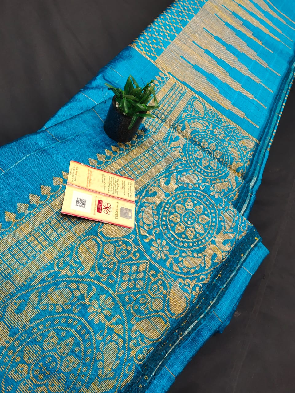 Pure raw silk saree with Zari border and body checks