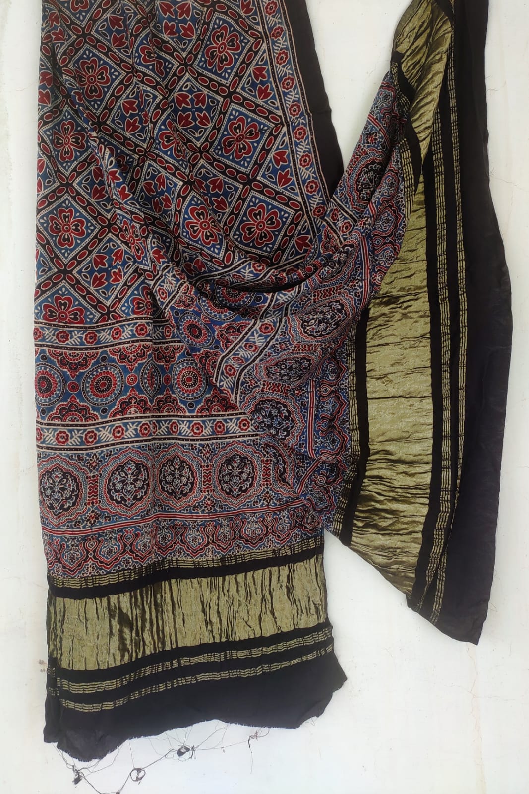 Ajrakh hand block printed Modal silk dupatta with Zari pallu